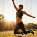 A person looking energetic and happy after achieving fitness goals.